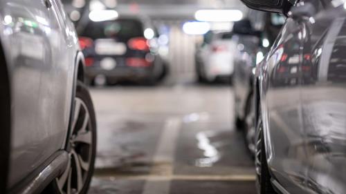 a row of parked cars on a city street at Holiday Inn - the niu, Dwarf Berlin Schöneberg by IHG in Berlin
