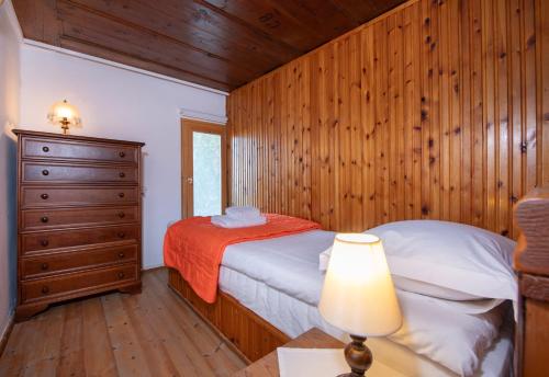 Ένα ή περισσότερα κρεβάτια σε δωμάτιο στο Ismini Apartments