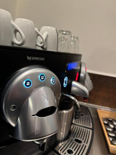 a coffee maker sitting on top of a counter at Hostal Fernando in Barcelona