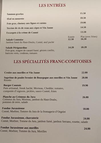 a picture of a menu for a restaurant at Hôtel Le Vouglans - Restaurant La Valouse in Orgelet