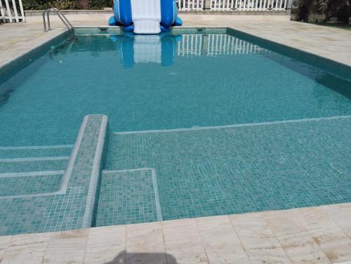 an empty swimming pool with at Casa rural Las Golondrinas in Huércal-Overa