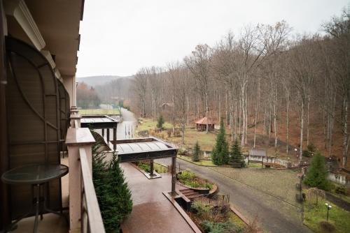 a balcony of a building with a view of a road at Solva Resort Medical & SPA in Polyana