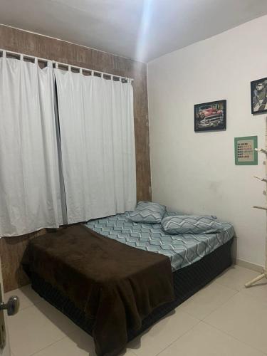 Postel nebo postele na pokoji v ubytování Nativo Hostel