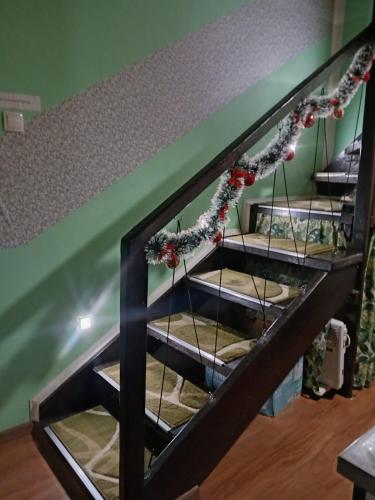 a group of bunk beds with christmas decorations at Sunny Side Fruska Gora - veliko imanje sa kucom za odmor in Velika Remeta
