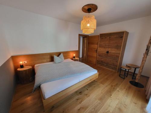Ένα ή περισσότερα κρεβάτια σε δωμάτιο στο Appartements Krautgasser