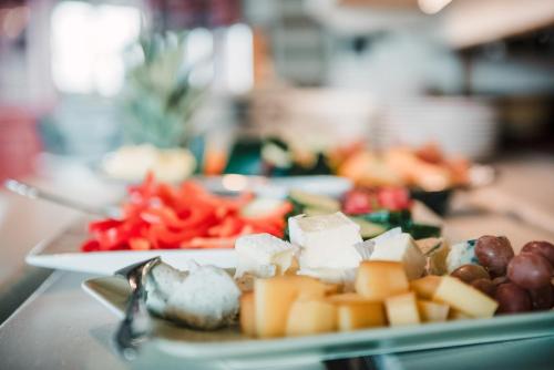 a plate of food with different types of food at Vågslidtun Hotel in Vågsli