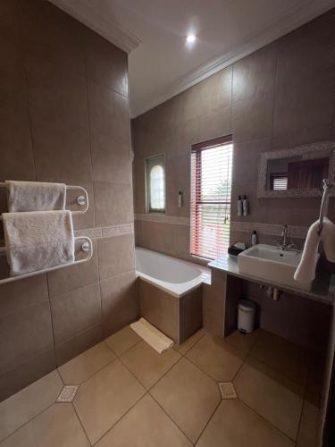 Ένα μπάνιο στο Bohemian Guesthouse - Pretoria