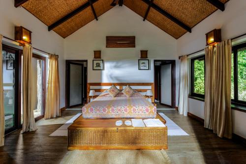 Ένα ή περισσότερα κρεβάτια σε δωμάτιο στο Bagh Villas I Kanha