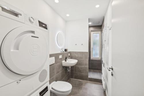 Bilik mandi di Apartment Kranich mit 3 Zimmern, top Infrastrukturlage HH Langenhorn, nähe Airport, Boxspringbetten und Arbeitsplätzen mit Glasfaser WLAN