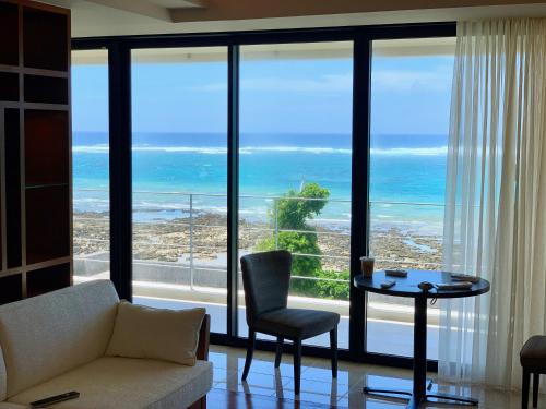 a living room with a view of the ocean at Sweet Villa OHJIMA in Ō-jima