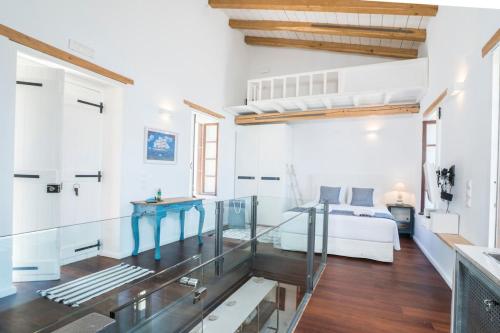 A seating area at kito- transformed house on the water's edge