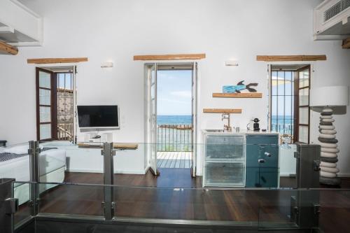 kito- transformed house on the water's edge