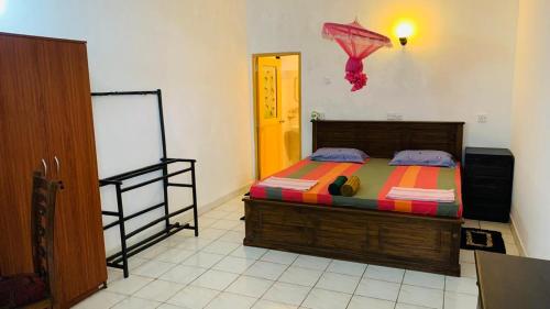 Postel nebo postele na pokoji v ubytování Tamaro Beach Resort