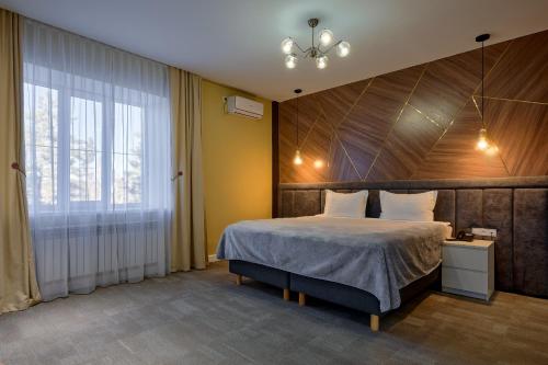 Кровать или кровати в номере Aisha Bibi Hotel & Spa Burabay