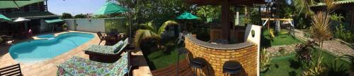 Kolam renang di atau dekat dengan Pousada Recanto Verde e Mar