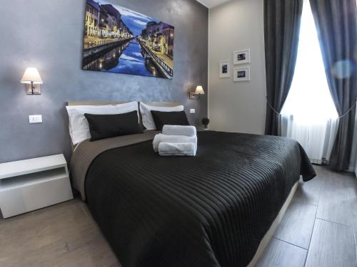 Postel nebo postele na pokoji v ubytování Bed Milano Linate