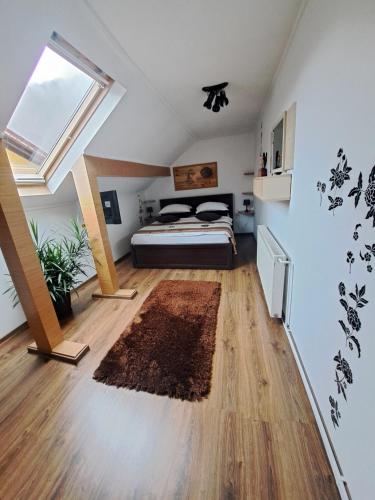 a bedroom with a bed in a room at Shelby Accommodation -Adult Only- in Sinaia