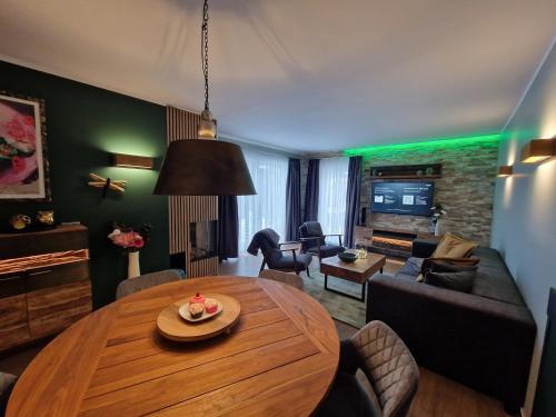 Posezení v ubytování Green Eagle Lodge