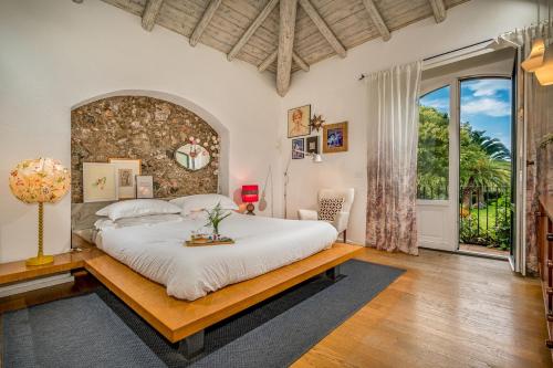 Postel nebo postele na pokoji v ubytování LINERA 10, Emma Villas