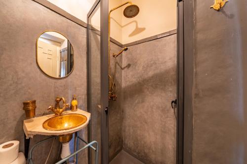a bathroom with a sink and a mirror at Dar Noubti in Marrakech