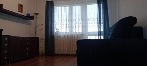 Een zitgedeelte bij Apartament WARSZAWSKA