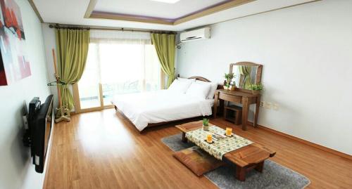 Televisyen dan/atau pusat hiburan di Jeju Bada Wi Olle Pension