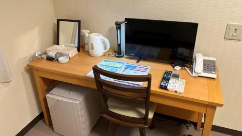 Телевизор и/или развлекательный центр в Hotel Higashihiroshima Hills Saijo