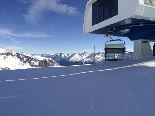 a ski lift sitting on top of a snow covered mountain at Ferienwohnung im Zentrum von Kappl Nähe Ischgl PAZN102 by FeWo-PLAN in Kappl