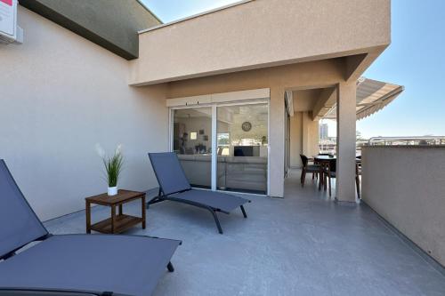 En balkon eller terrasse på Penthouse Sunce