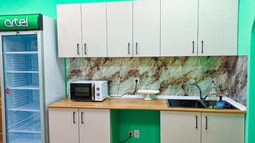 Kuchyň nebo kuchyňský kout v ubytování Sun Hostel