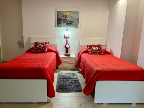 Giường trong phòng chung tại Villa Eden