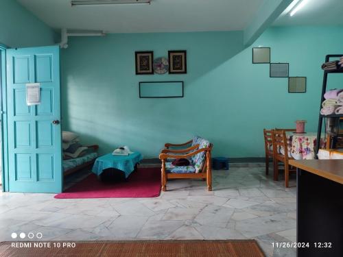 Χώρος καθιστικού στο Homestay Dasuqi