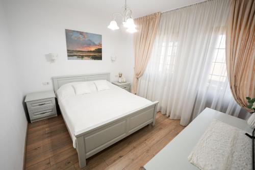 Postel nebo postele na pokoji v ubytování Casa Andra