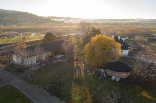 an overhead view of a house with a tree at Casa Andra in Siret