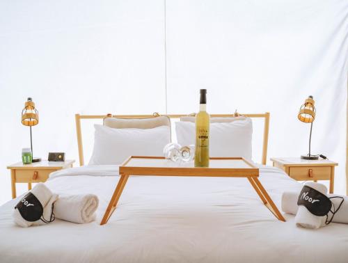 Katil atau katil-katil dalam bilik di Noor Glamping