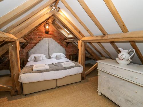 Cama o camas de una habitación en Fairoaks Barns