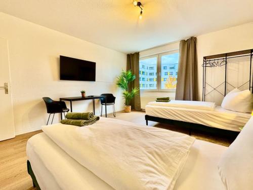 Ένα ή περισσότερα κρεβάτια σε δωμάτιο στο Larooms One