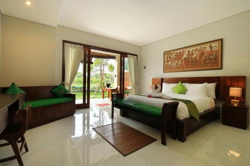 Una cama o camas en una habitación de Ubud Tropical Garden