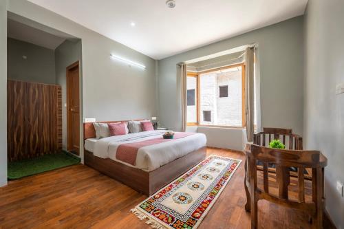 Una cama o camas en una habitación de Abbu's Dream Nest