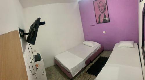 Postel nebo postele na pokoji v ubytování La Clave Hostel