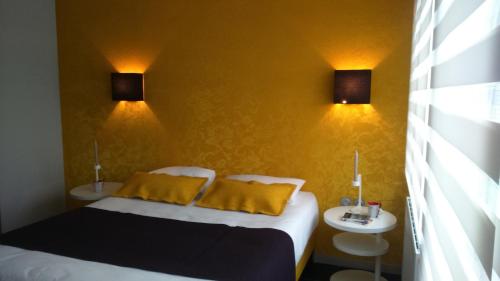Postel nebo postele na pokoji v ubytování Tempologis Grenoble