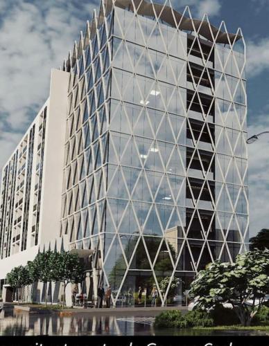 a large office building with a lot of windows at S O P H I A room by 50 shades in Baia Mare