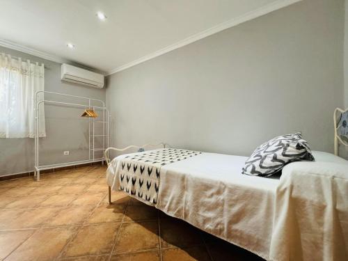 Ένα ή περισσότερα κρεβάτια σε δωμάτιο στο Can Conill Llucmajor