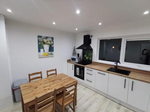 Kuchyň nebo kuchyňský kout v ubytování Lemon Apartment