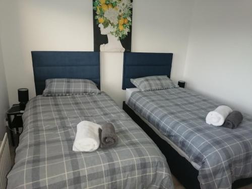 Postel nebo postele na pokoji v ubytování Lemon Apartment