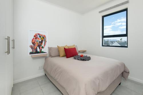Ένα ή περισσότερα κρεβάτια σε δωμάτιο στο Perlemoen Apartments