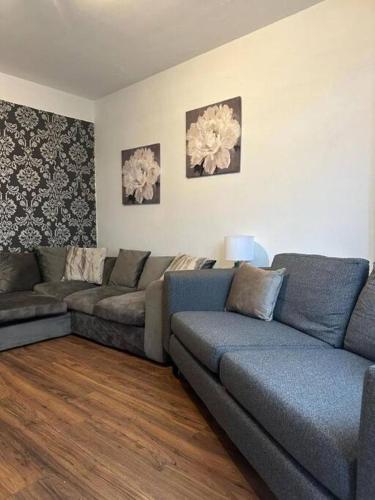a living room with a couch and two couches at Spacious 4Bedroom House in Warrington - Sleeps 8 in Warrington