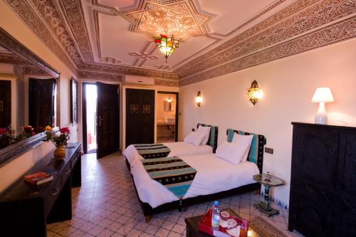 Llit o llits en una habitació de Riad Signature