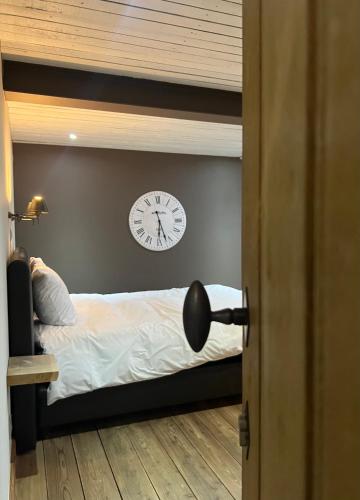 Una cama o camas en una habitación de B&B Le Briquemont