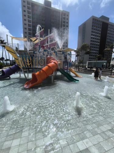 a water park with a water slide in a fountain at Salinas Exclusive Resort in Salinópolis